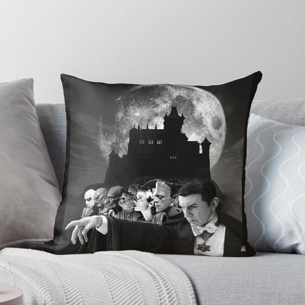 Decorative pillow featuring iconic horror movie characters like Dracula, Frankenstein, and the Wolfman