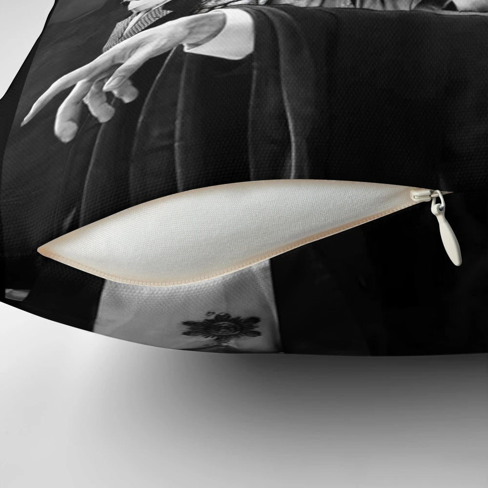 Decorative pillow featuring iconic horror movie characters like Dracula, Frankenstein, and the Wolfman