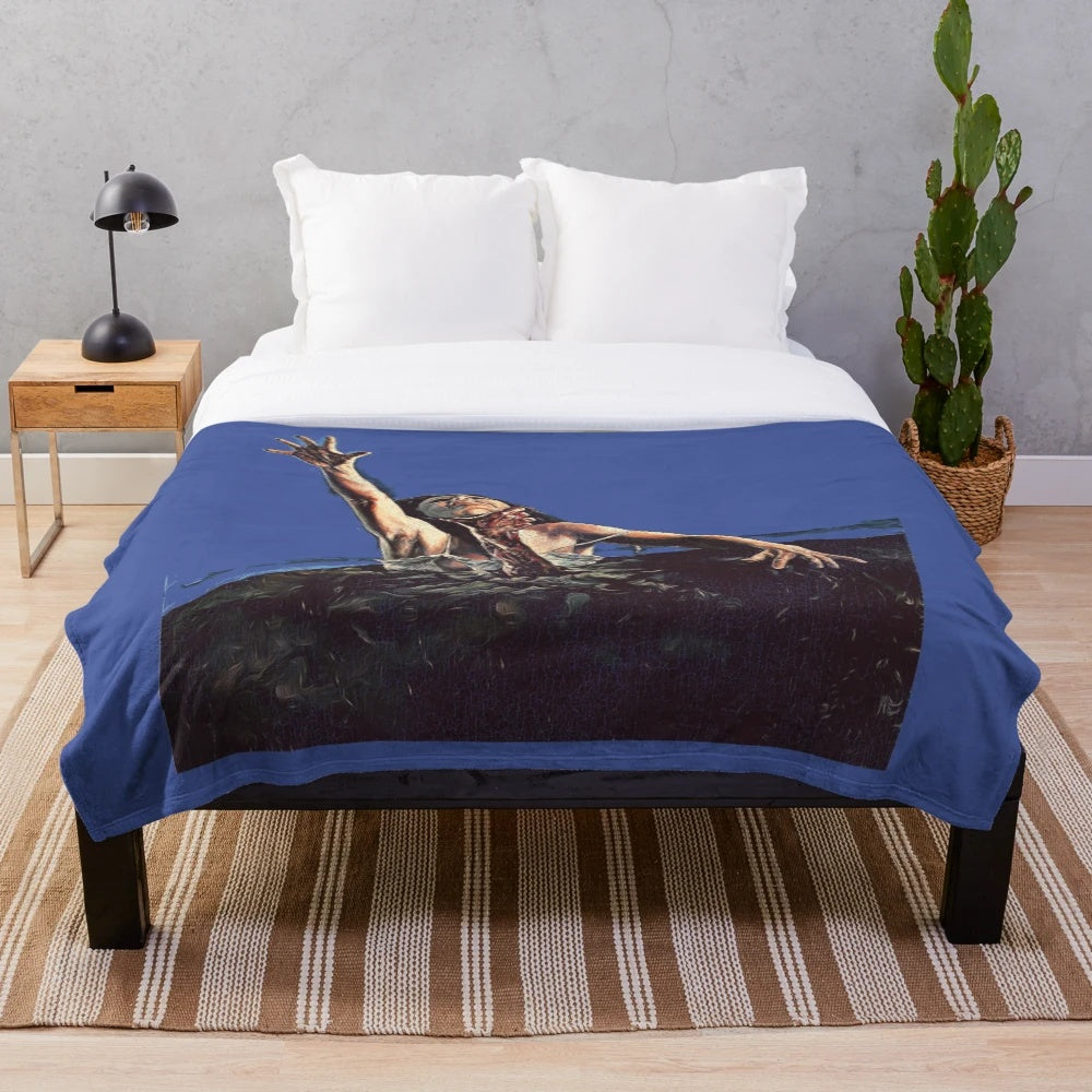 Evil Dead themed plush blanket with cult horror movie design