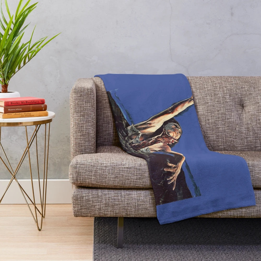 Evil Dead themed plush blanket with cult horror movie design
