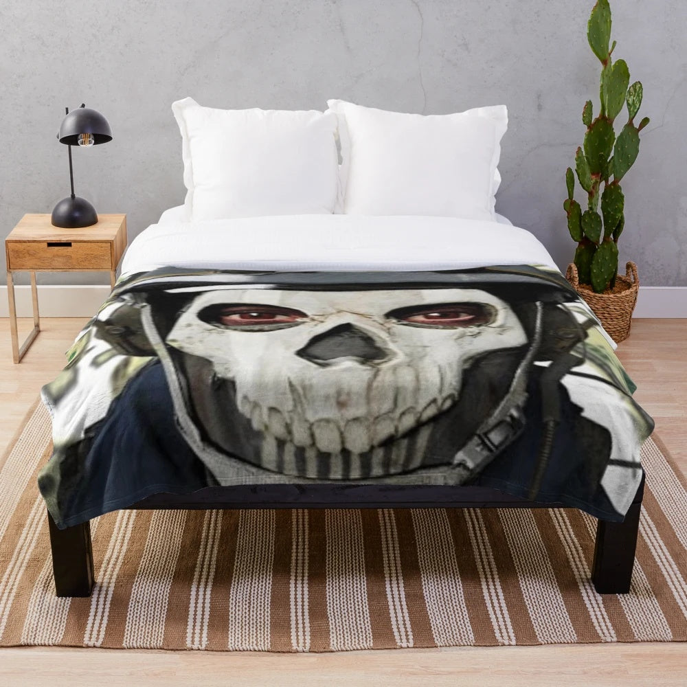 Soft and cozy plush blanket featuring a ghost design, perfect for COD MW2 enthusiasts