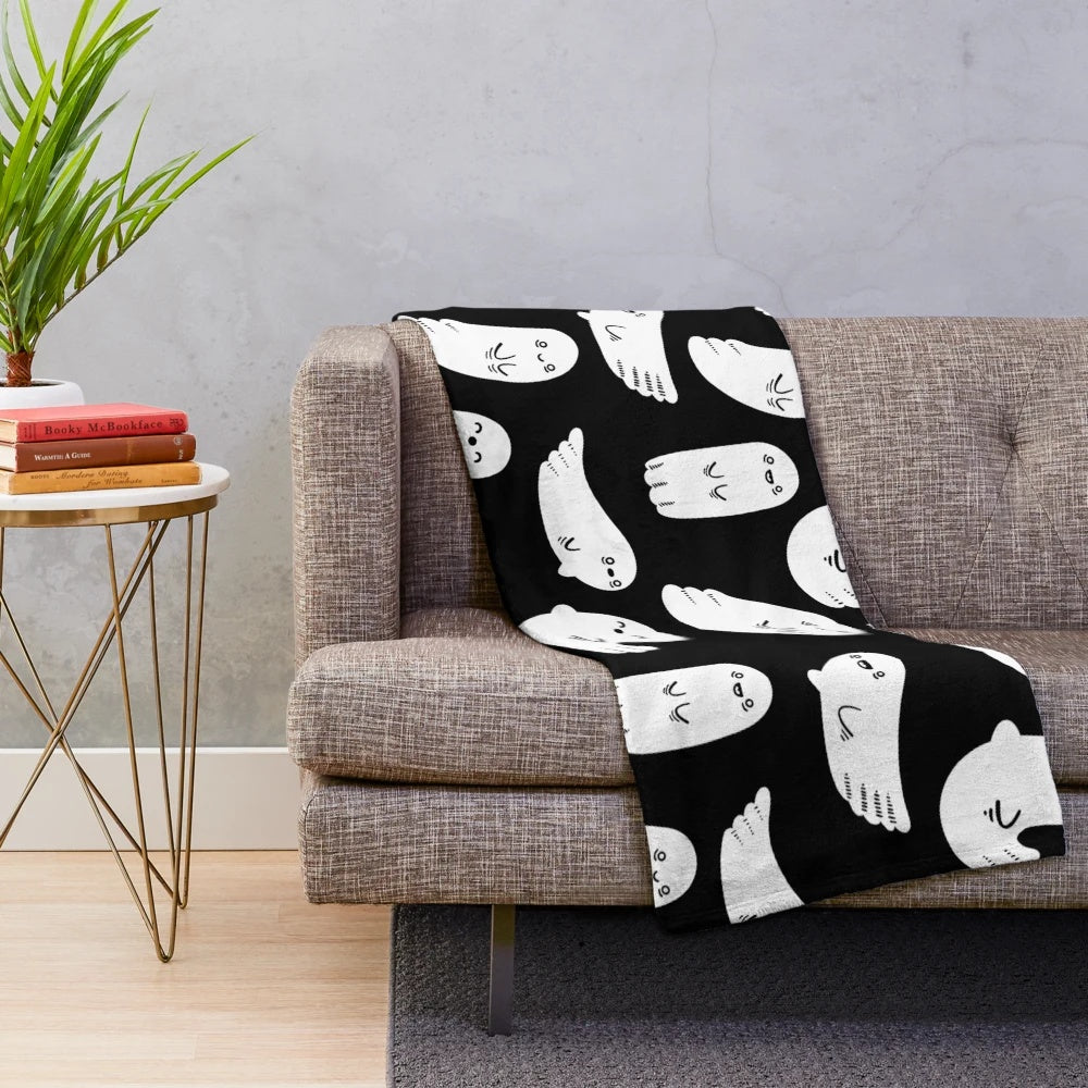 Soft and cuddly black and white ghost plush blanket