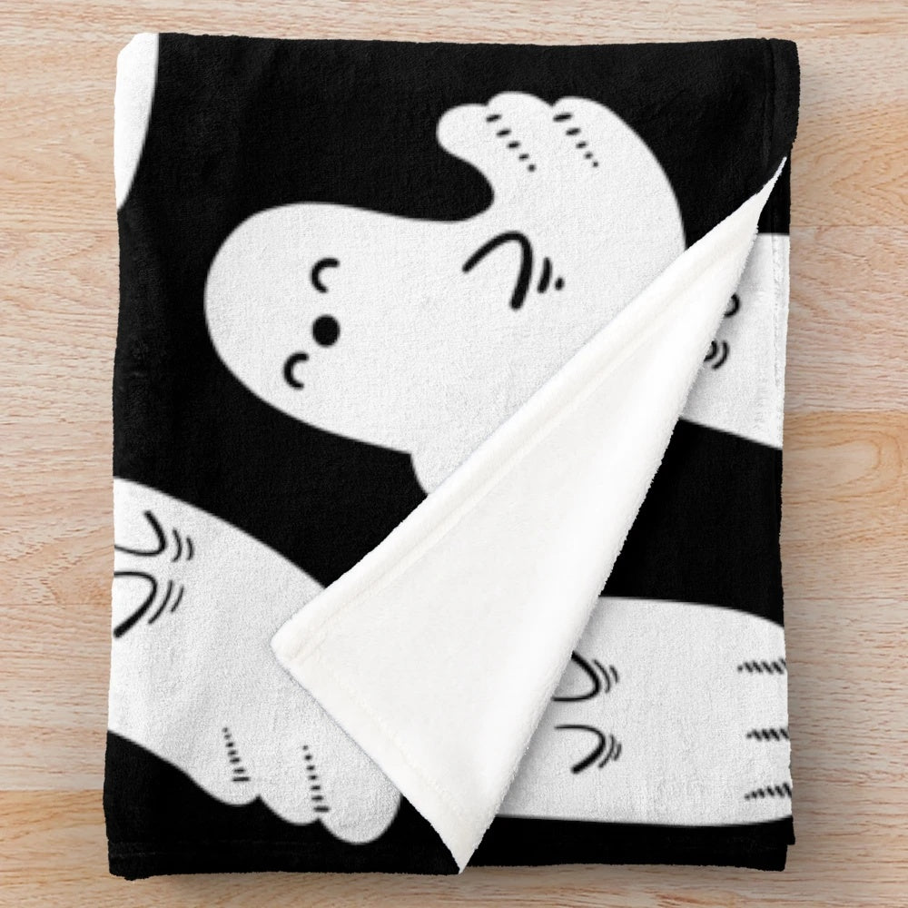 Soft and cuddly black and white ghost plush blanket