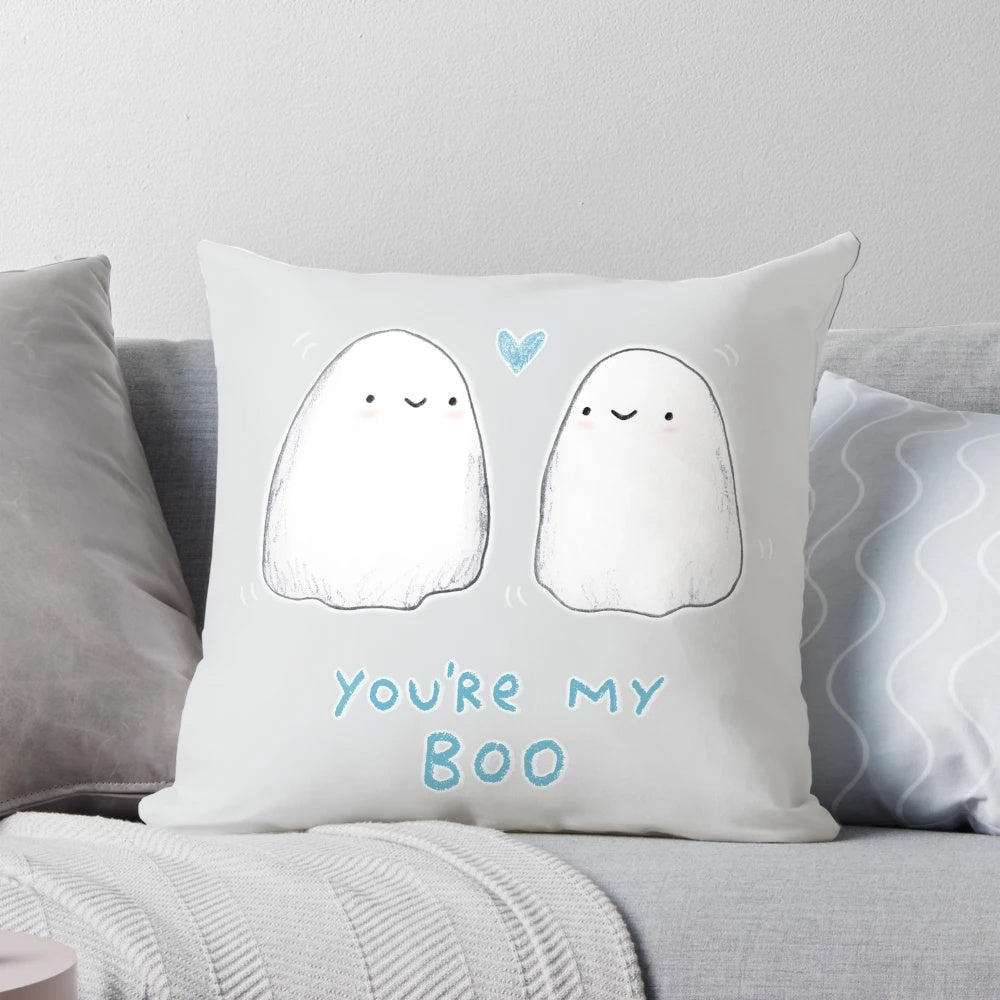 Soft, plush pillow with a spooky love design featuring ghosts and hearts