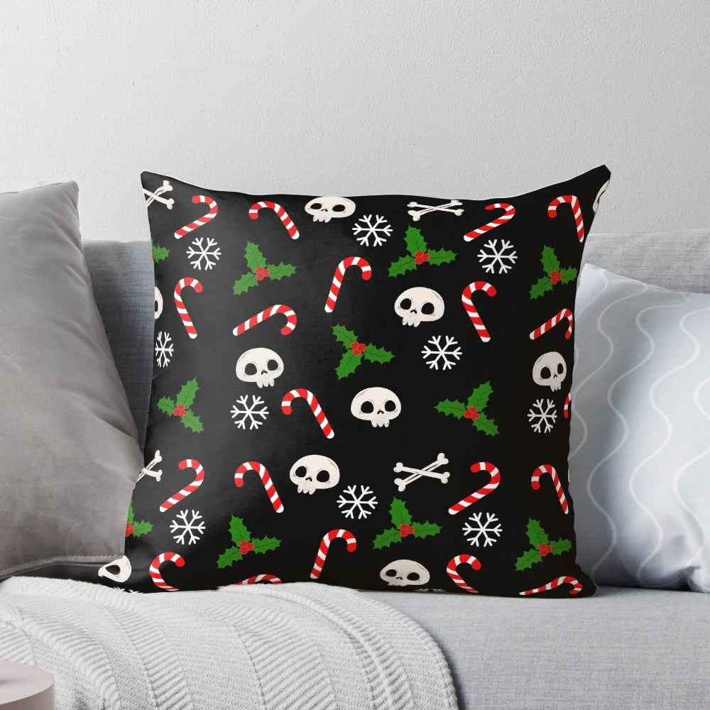 A gothic-style Christmas pillow featuring skulls, holly, and a moody black and red pattern.