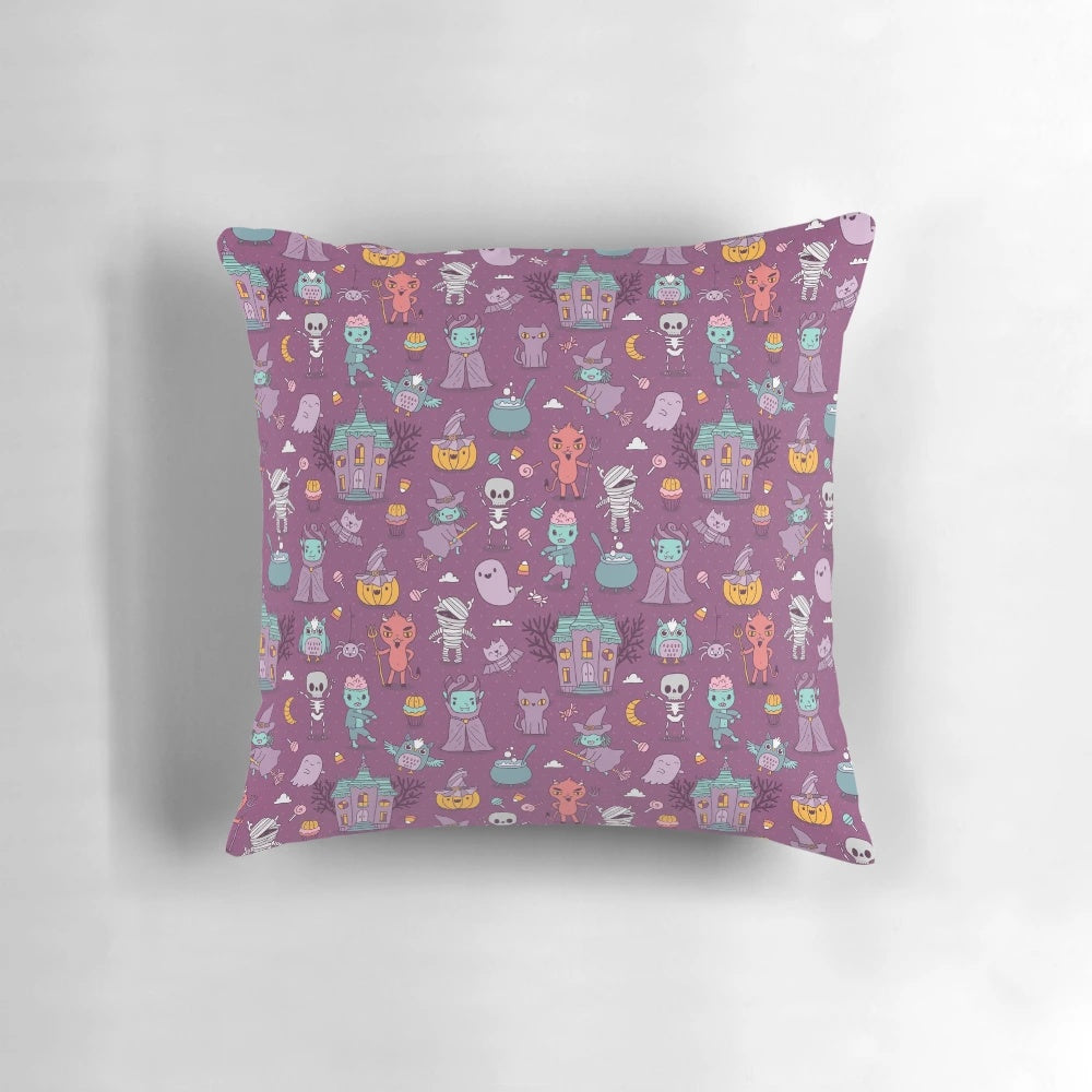 A spooky and festive Halloween-themed pillow featuring a creepy devil, vampire, and other Halloween icons.