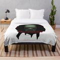 Halloween-themed plush blanket with spooky designs