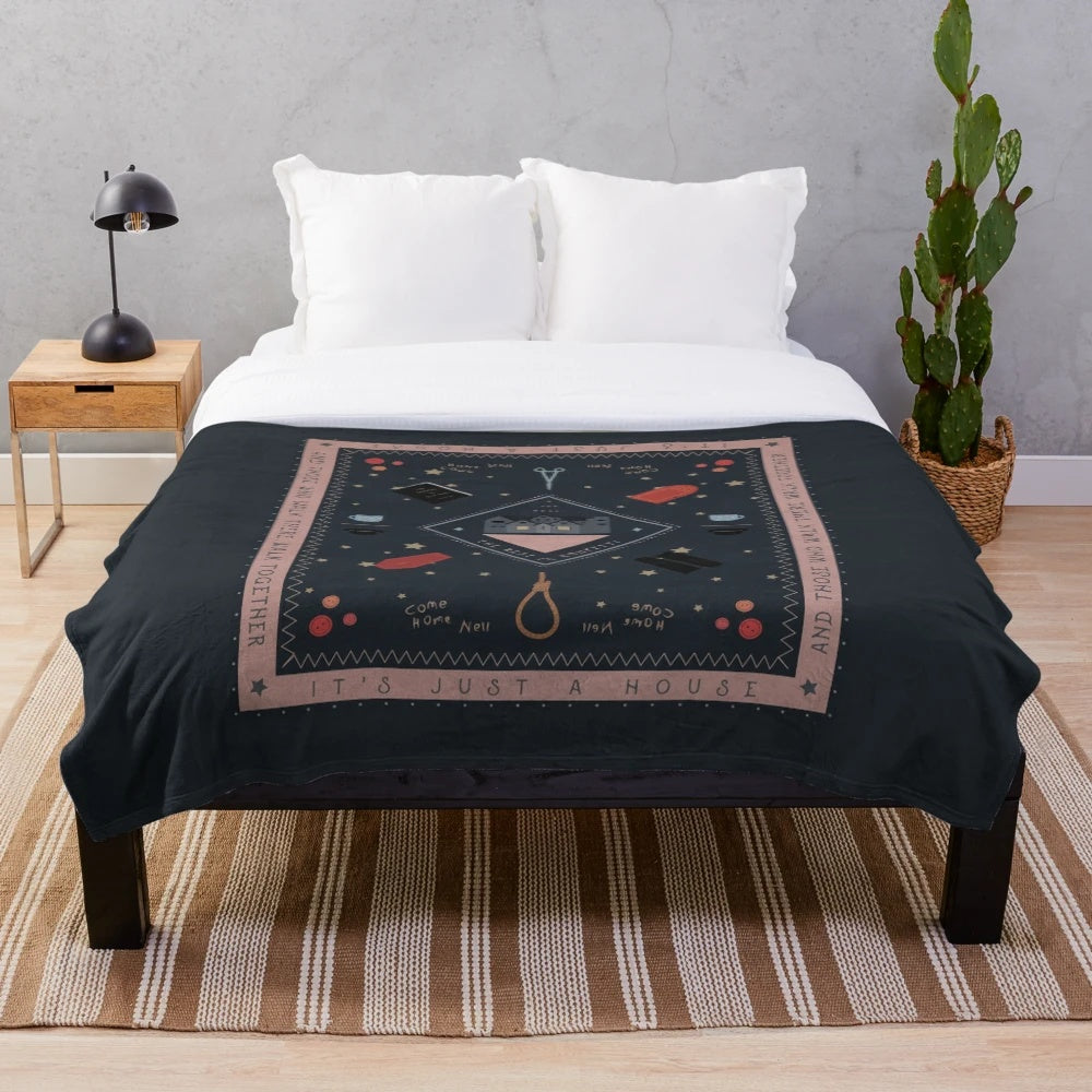 Plush blanket featuring haunted house design inspired by the Netflix series The Haunting of Hill House