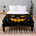 Jack-o'-lantern plush blanket for Halloween and horror movie enthusiasts