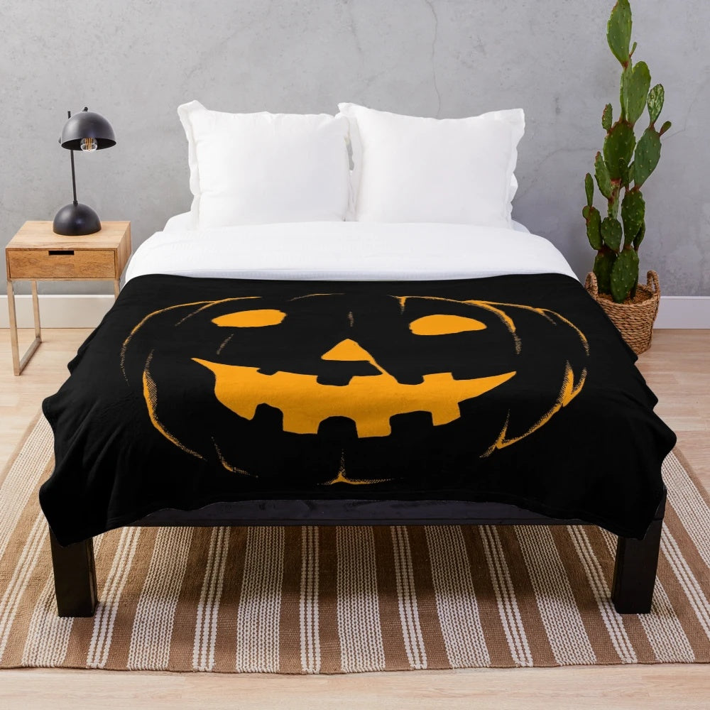 Jack-o'-lantern plush blanket for Halloween and horror movie enthusiasts