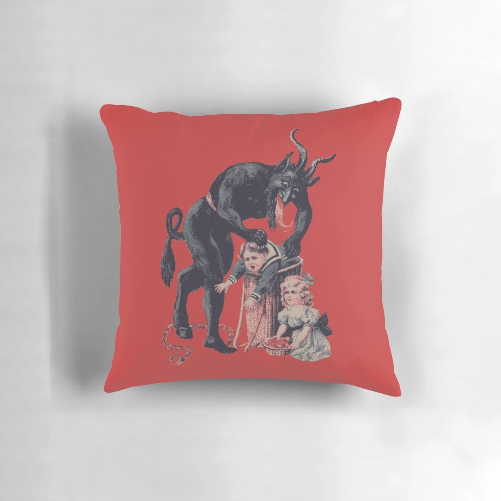 Merry Christmas Krampus-themed decorative throw pillow with black and red design