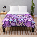 Spooky mushroom pattern plush blanket with woodland creatures and fantasy design