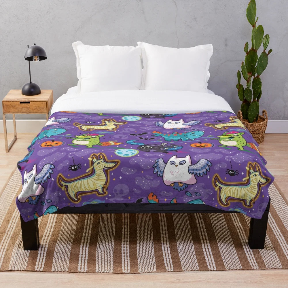 Spooky night plush blanket with Halloween-themed graphic design