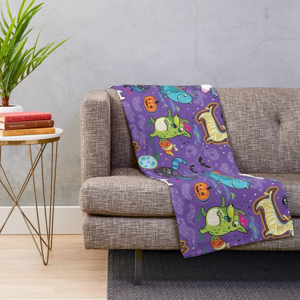 Spooky night plush blanket with Halloween-themed graphic design
