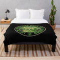 Optometrist plush blanket with spooky halloween elements like cats, bats, and spider webs