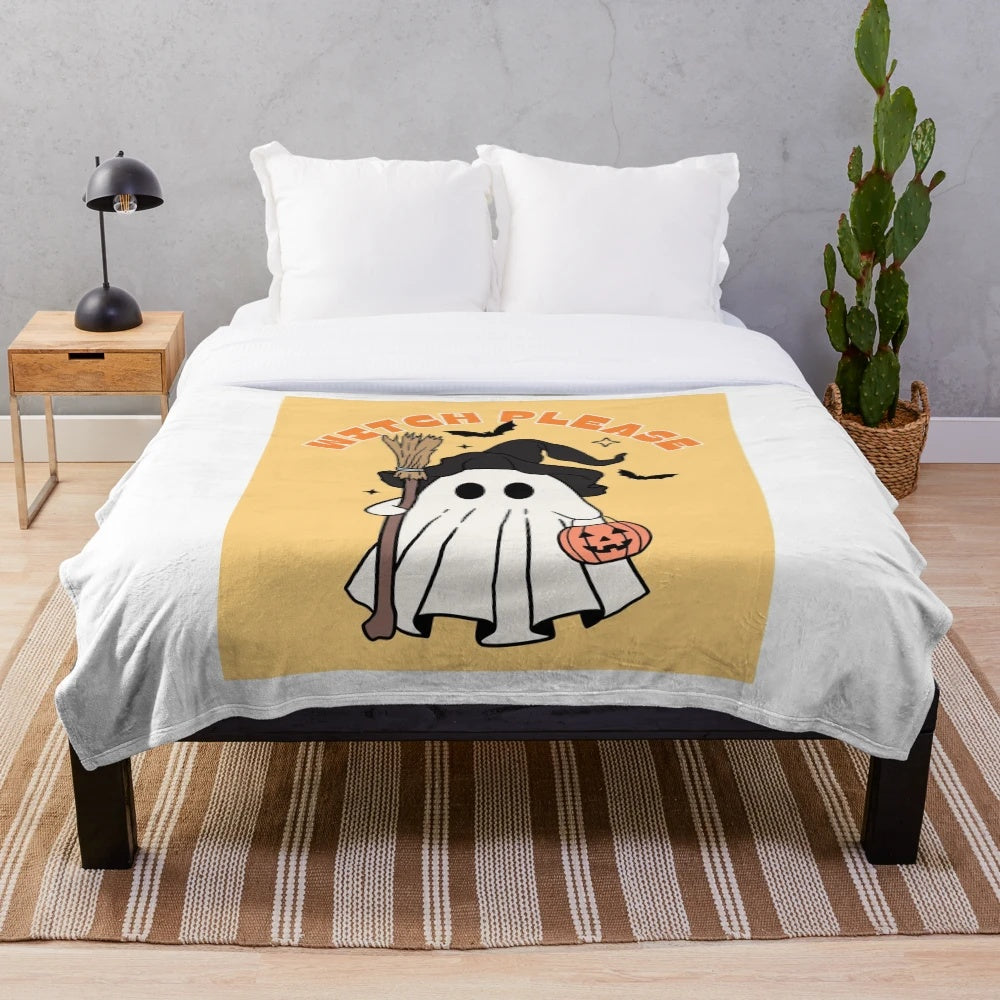 Orange plush blanket with "Witch Please" text and Halloween-themed patterns like bats, ghosts, and pumpkins