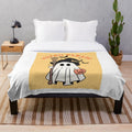 Orange plush blanket with "Witch Please" text and Halloween-themed patterns like bats, ghosts, and pumpkins