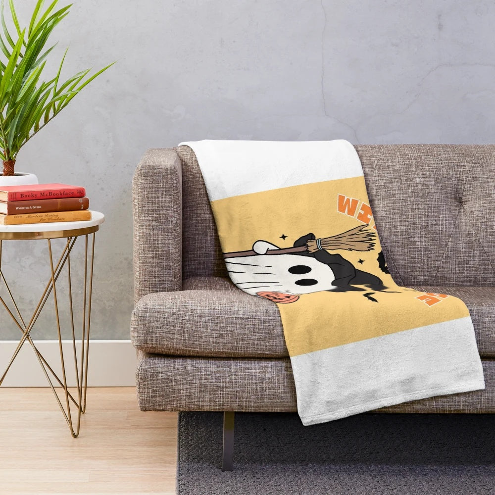 Orange plush blanket with "Witch Please" text and Halloween-themed patterns like bats, ghosts, and pumpkins