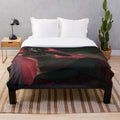 Spooky plush blanket featuring an eerie wolf creature design