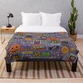 Spooky plush blanket featuring whimsical Halloween designs