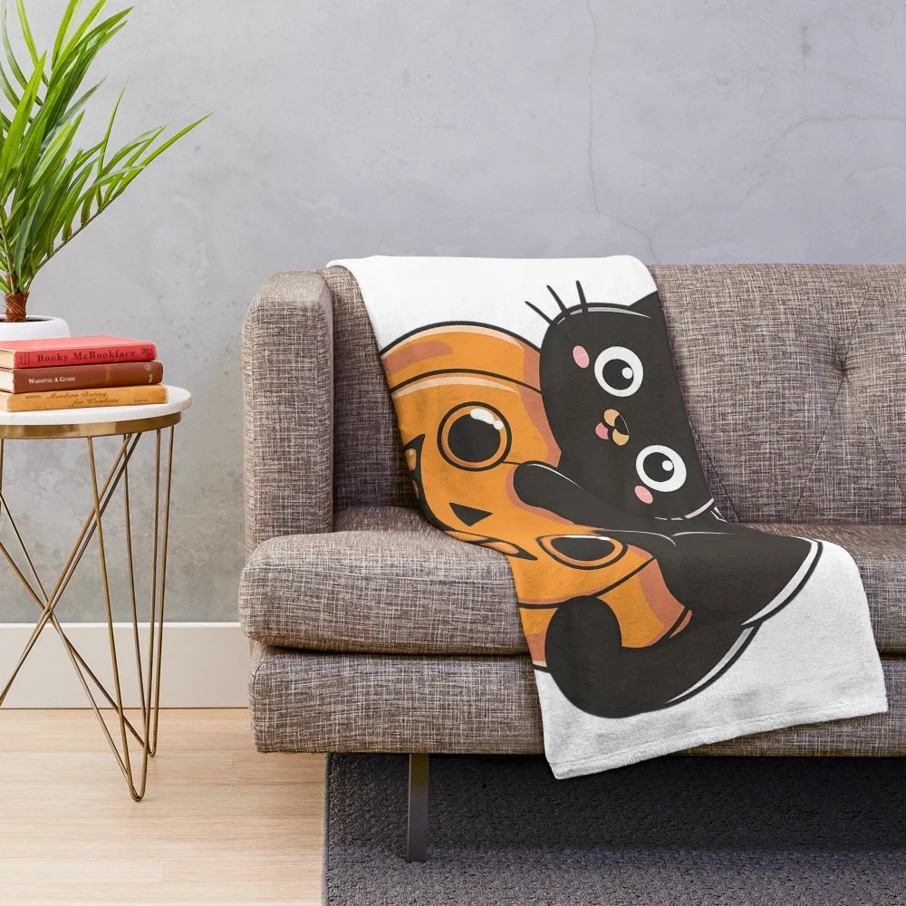 Spooky plush blanket featuring cats, ghosts, and Halloween-themed design