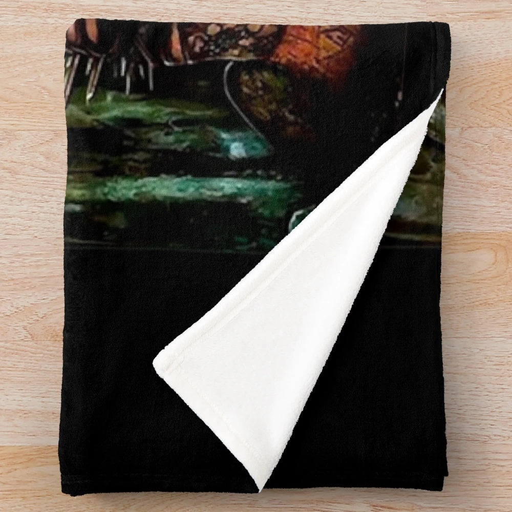Retro horror movie-inspired plush blanket with spooky design
