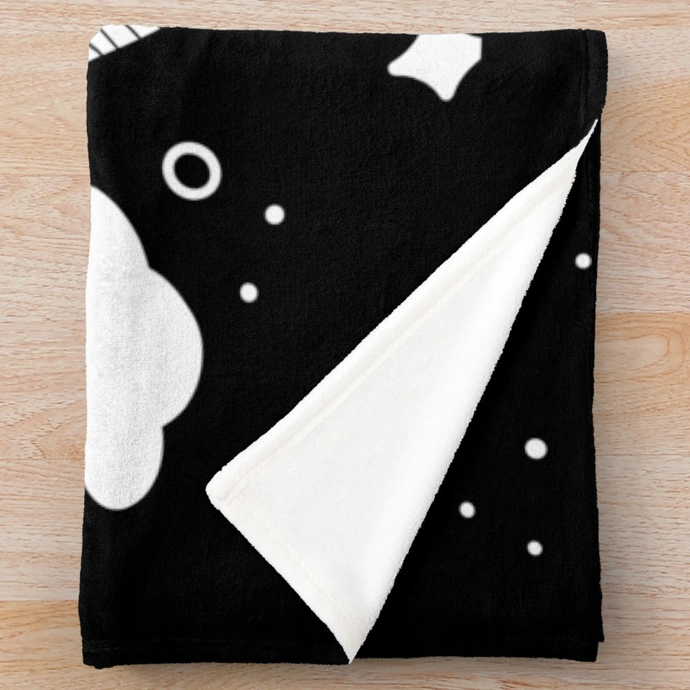 Soft and cozy plush blanket featuring adorable black and white ghosts