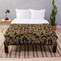 Plush Halloween-themed blanket with pumpkin and black pattern