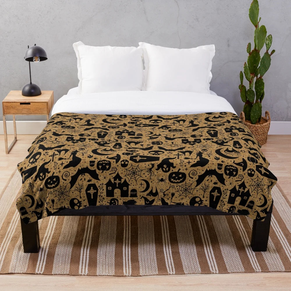 Plush Halloween-themed blanket with pumpkin and black pattern