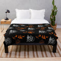 Black and white pumpkin and skeleton pattern plush blanket