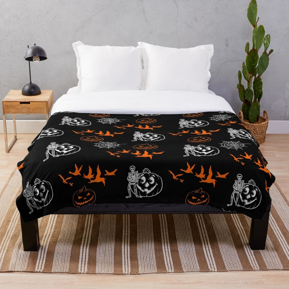 Black and white pumpkin and skeleton pattern plush blanket