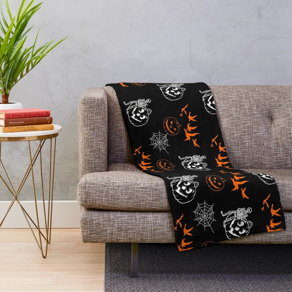 Black and white pumpkin and skeleton pattern plush blanket