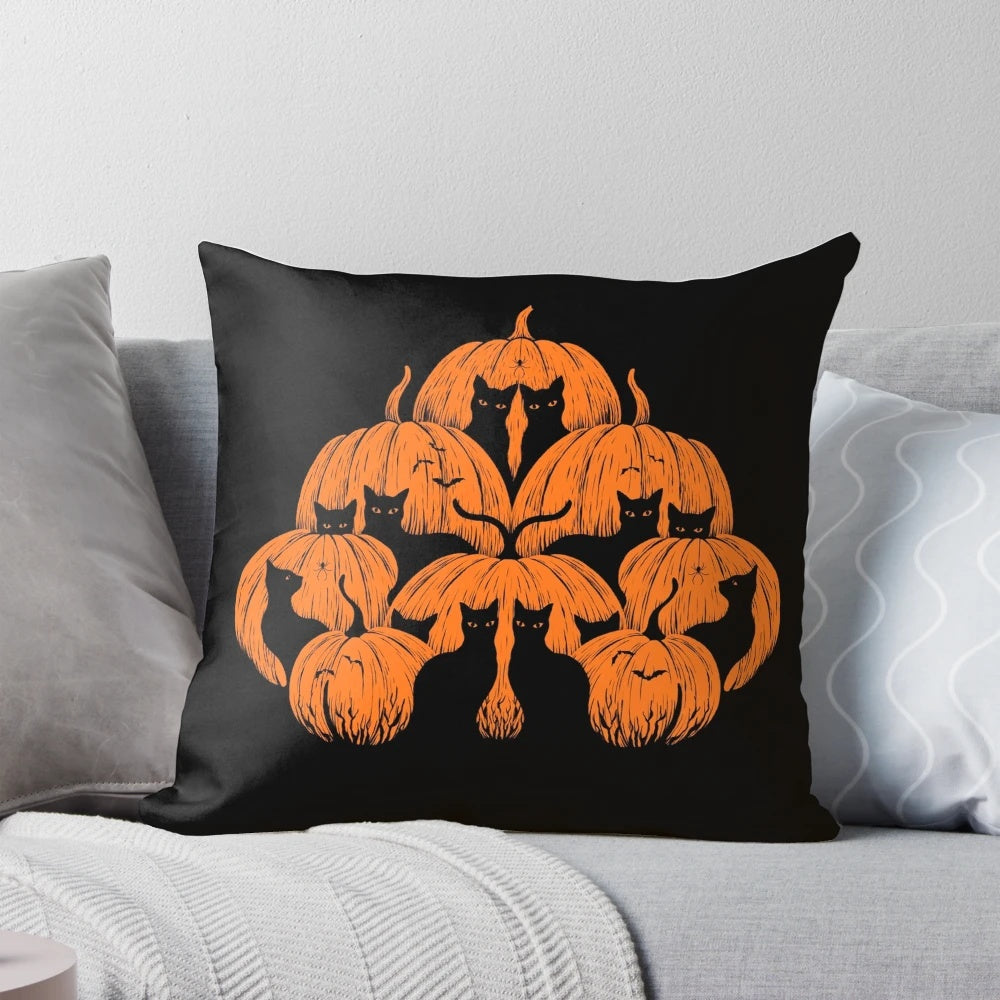 A whimsical pumpkin-shaped cat pillow in black, white, and orange for cozy, festive home decor.