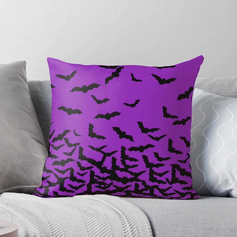 A plush purple bats pillow perfect for Halloween and Gothic home decor.