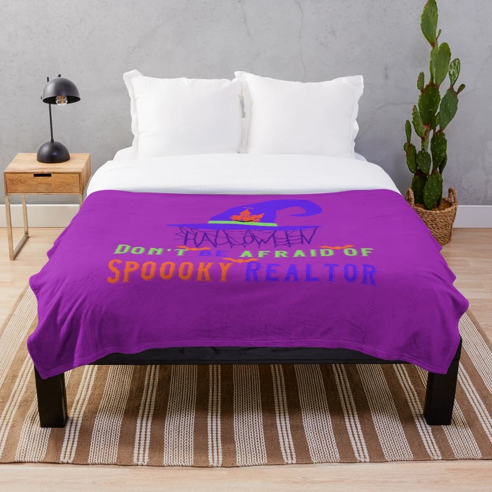 Spooky realtor plush blanket with witch hat and bats