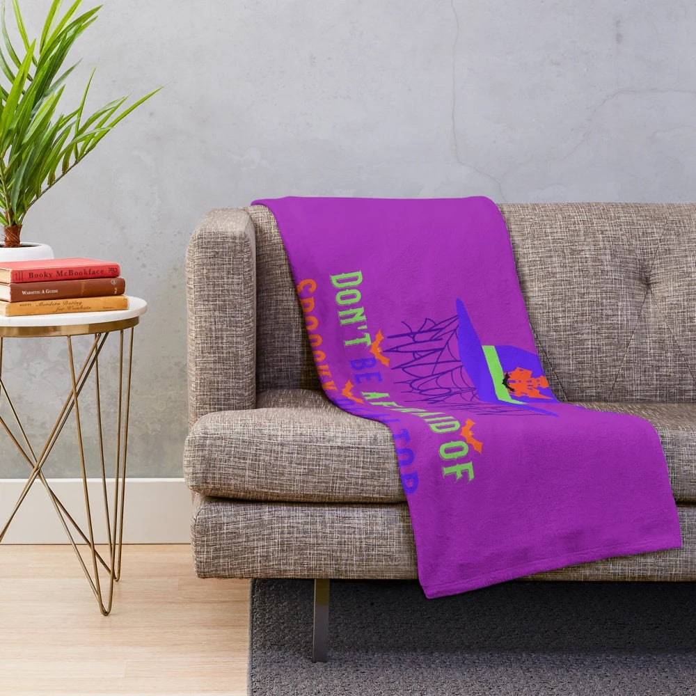 Spooky realtor plush blanket with witch hat and bats