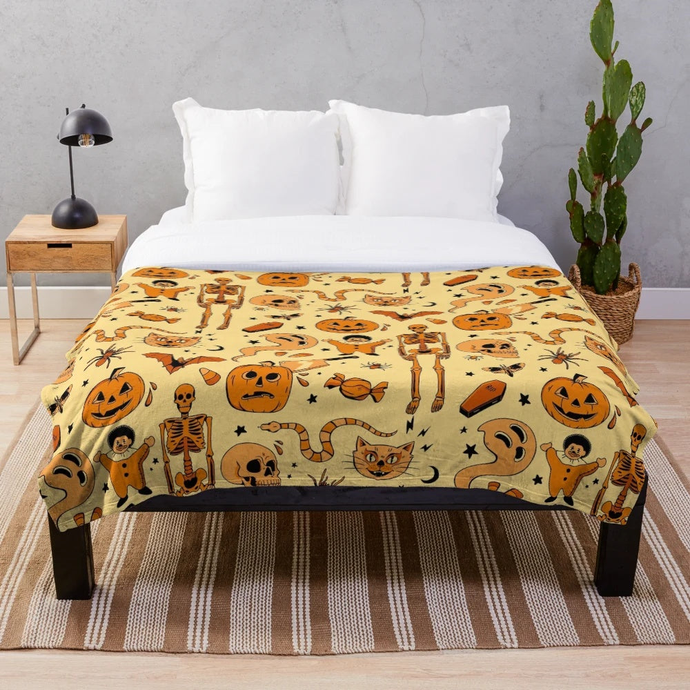 Cozy retro-style plush blanket with Halloween-themed design