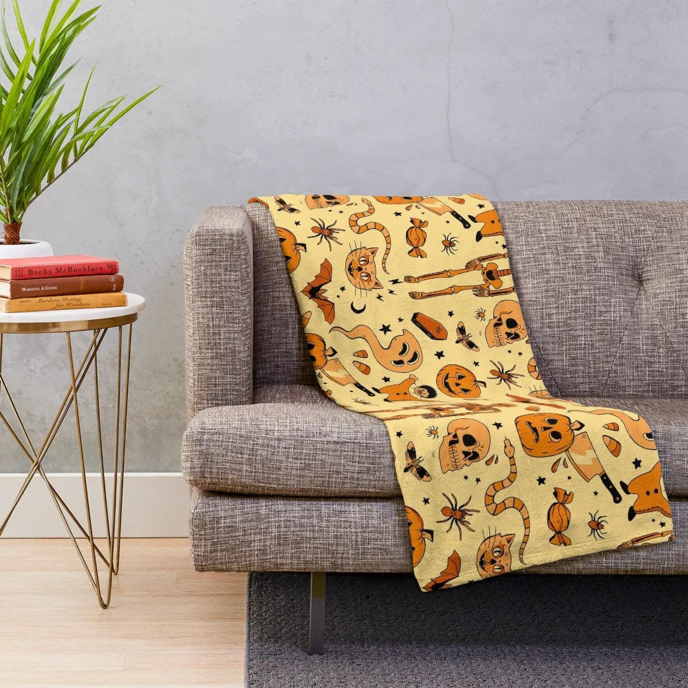 Cozy retro-style plush blanket with Halloween-themed design