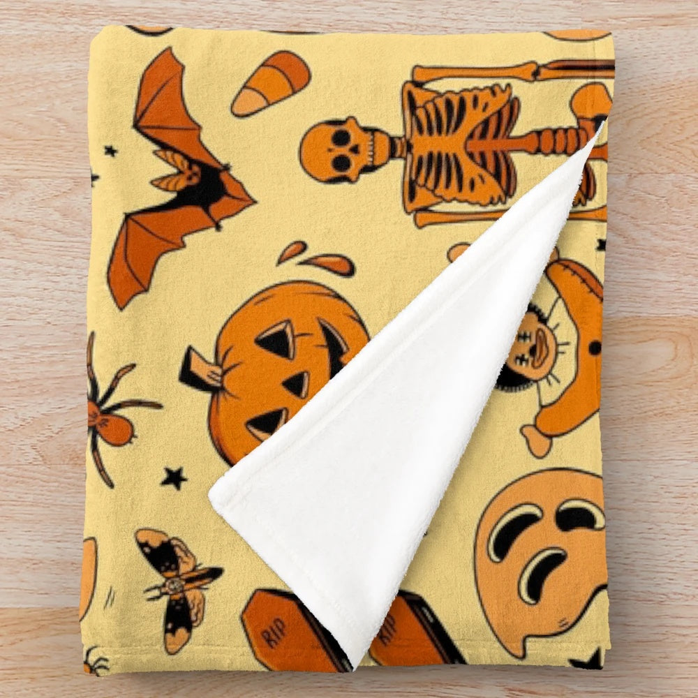 Cozy retro-style plush blanket with Halloween-themed design