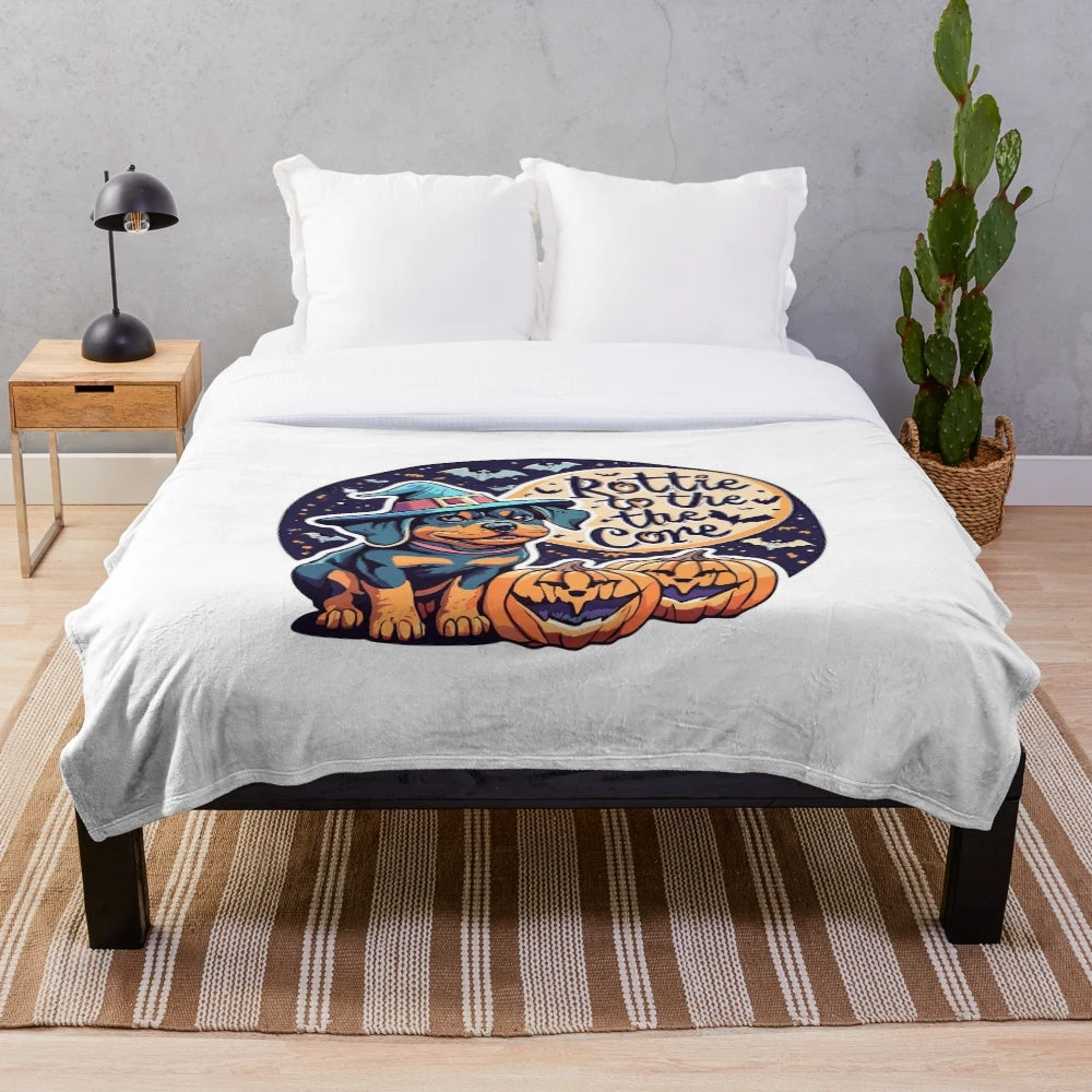 Cozy rottweiler Halloween plush blanket with a funny witch design