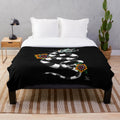 Sandworm plush blanket with a black and white floral design inspired by Tim Burton's iconic creature