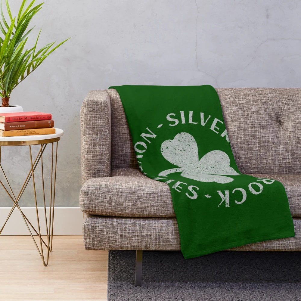 Silver Shamrock inspired plush blanket with pumpkin and horror movie elements