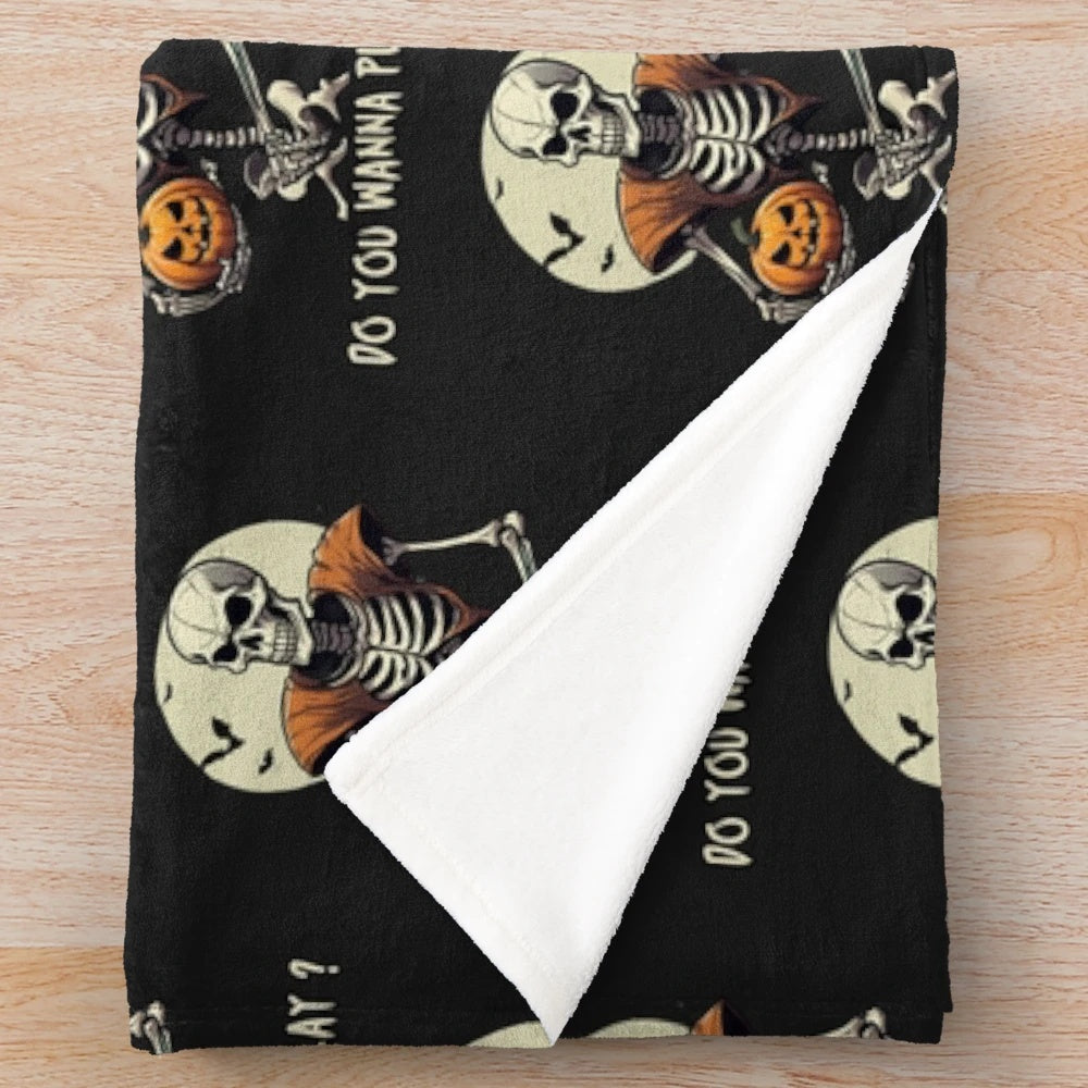 Skeleton playing basketball on a plush, warm blanket