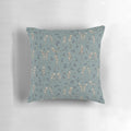 Blue decorative pillow featuring a dancing skeleton design, perfect for Halloween home decor.