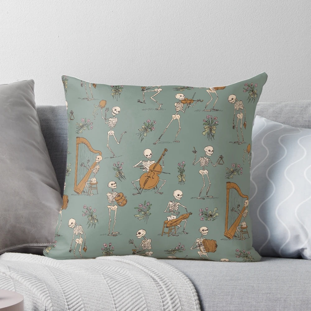 A decorative pillow featuring a skeleton orchestra with various musical instruments like harp, dulcimer, spoons, and more.