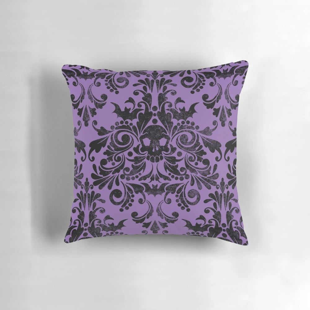 Skull-patterned pillow with a gothic damask design, perfect for adding a touch of spookiness to your home decor.