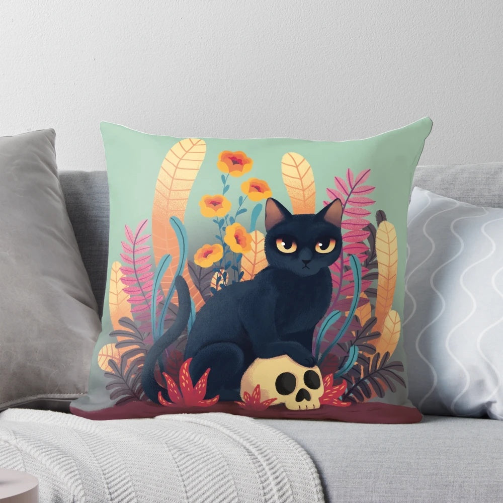 A black cat with a skull face surrounded by autumn flowers and foliage