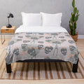 Spooky skull plush blanket for Halloween decor