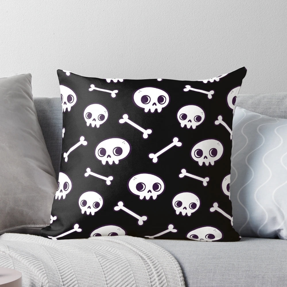 Soft, cozy pillow featuring a repeating pattern of cute, minimalist skulls in shades of black and white.