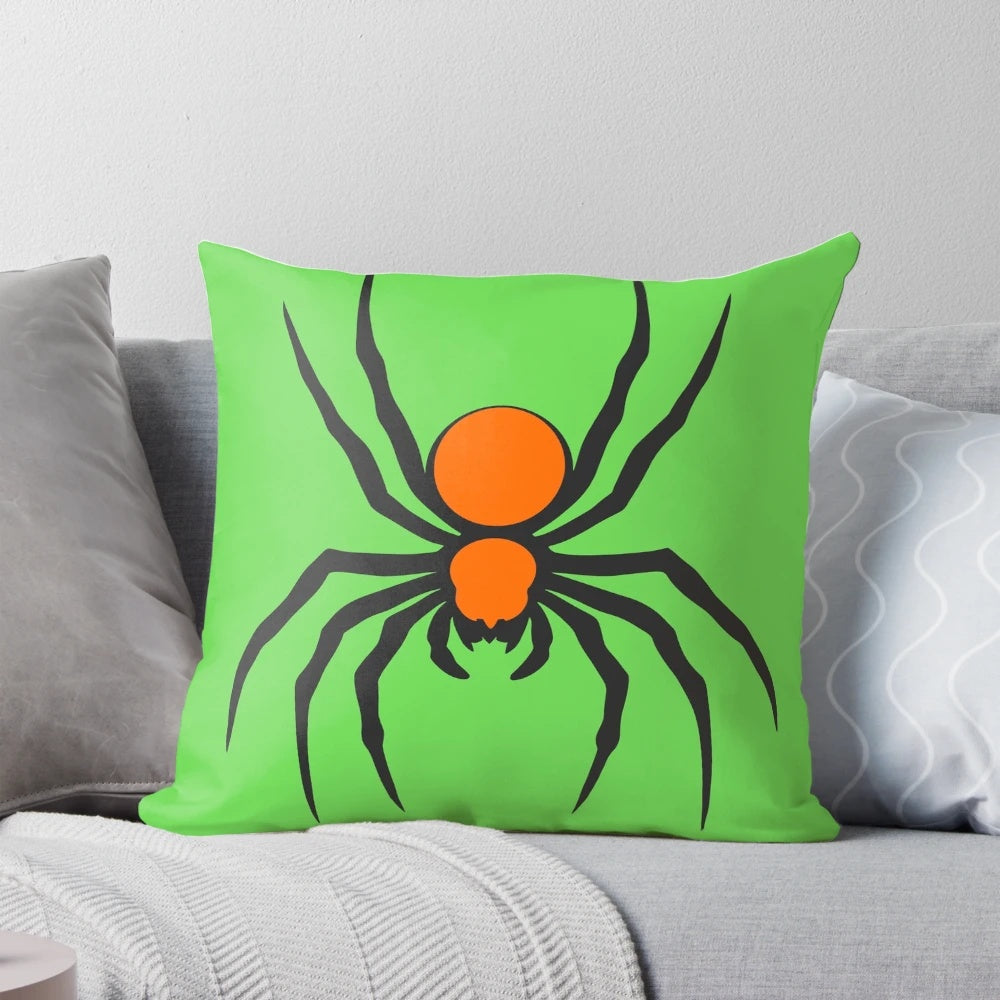Dangerous black and orange spider graphic on a cozy pillow
